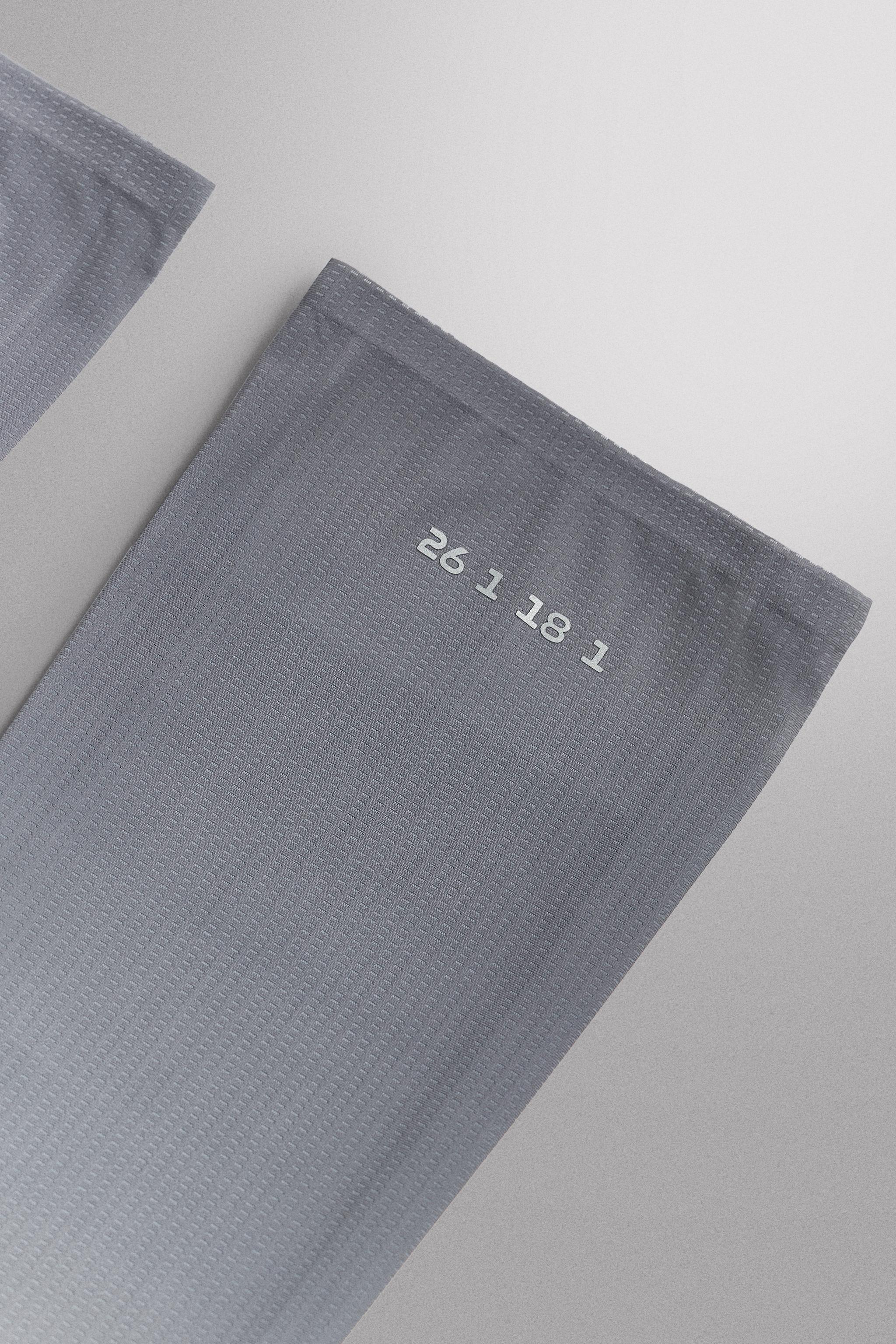 RUNNING ARM WARMERS